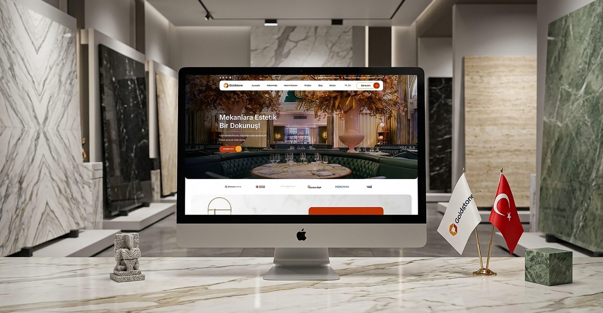 Goldstone doğal taş markasının web sitesi, mermer showroomdaki masaüstü bilgisayarda