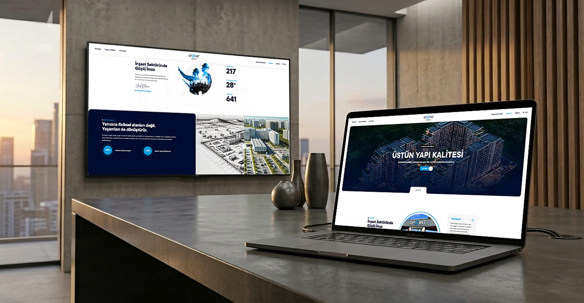 Spoint İnşaat için tasarlanan kurumsal web sitesinin ekran ve dizüstü bilgisayardaki görünümü